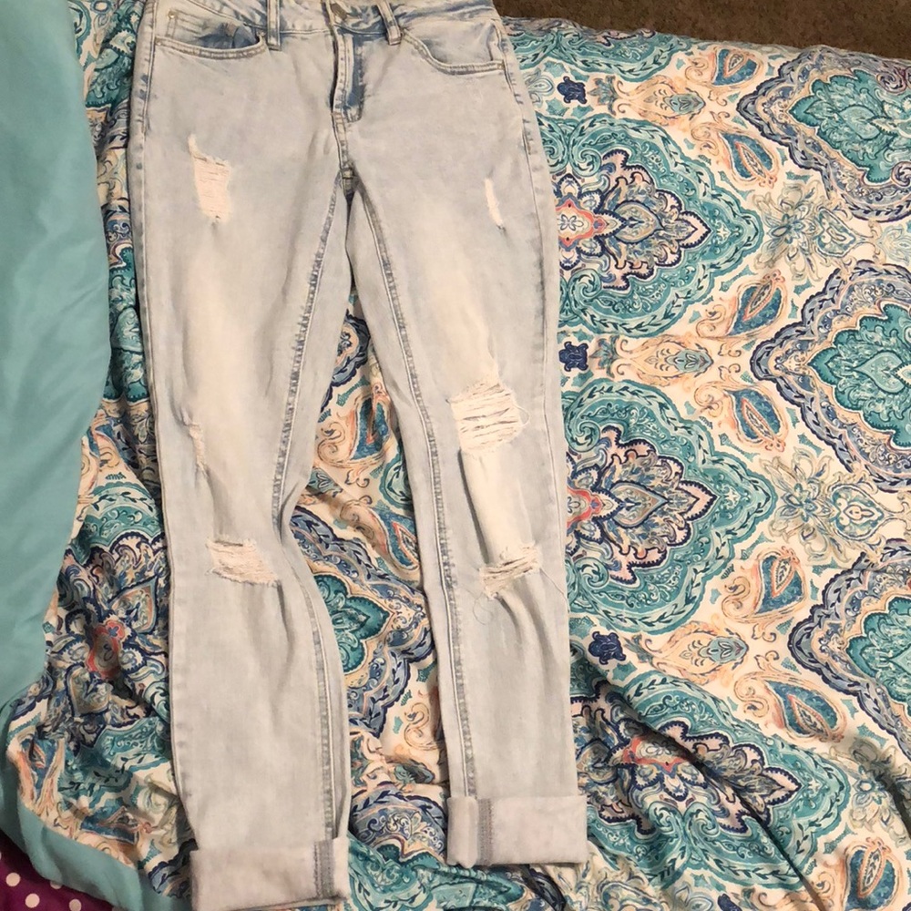 Acid light wash skinny jeans with holes